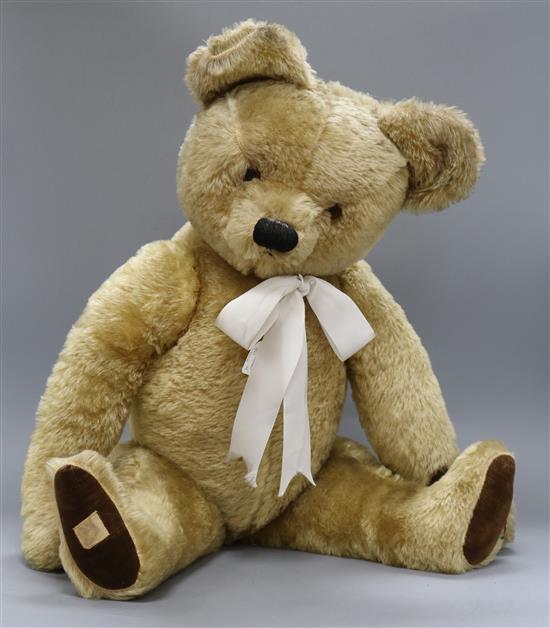 A 1950s Chad Valley teddy bear, Nicky, with golden mohair, deep amber and black glass eyes, black stitched